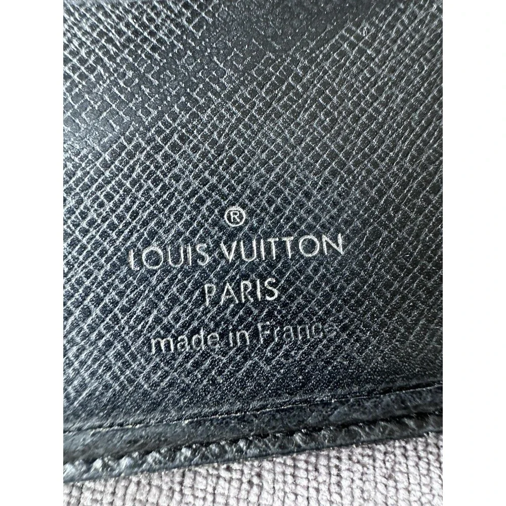 Louis Vuitton Men's Black Taiga Bifold Wallet preowned